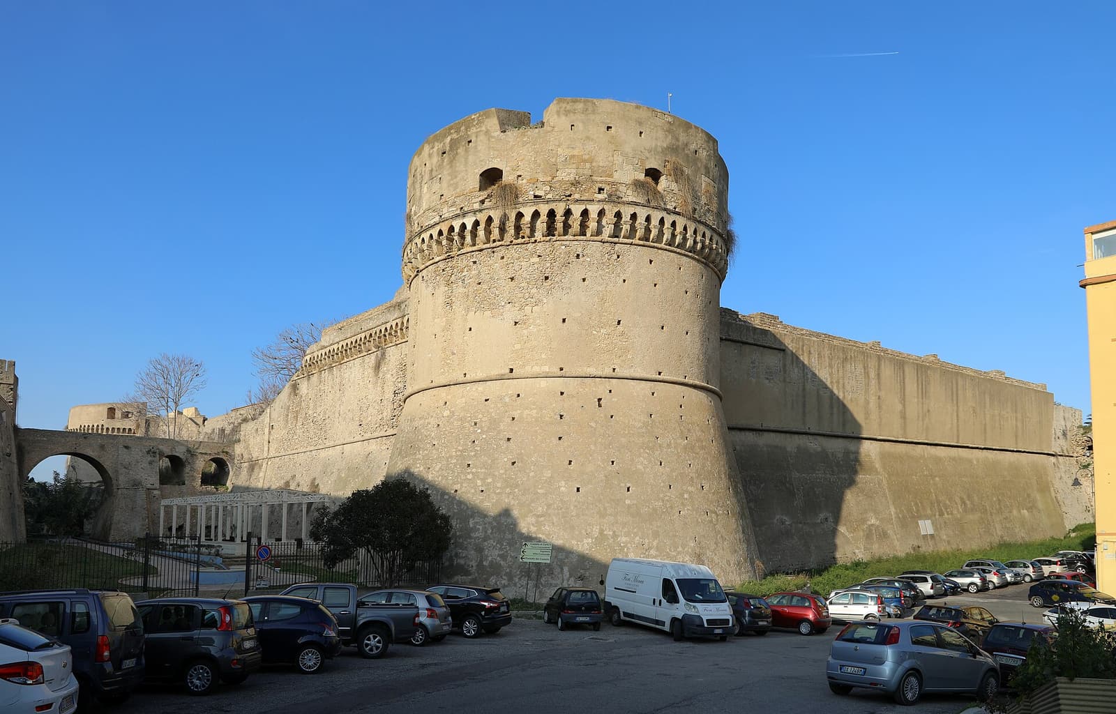 A round tower of the Castle of Charles V above the old town of Crotone